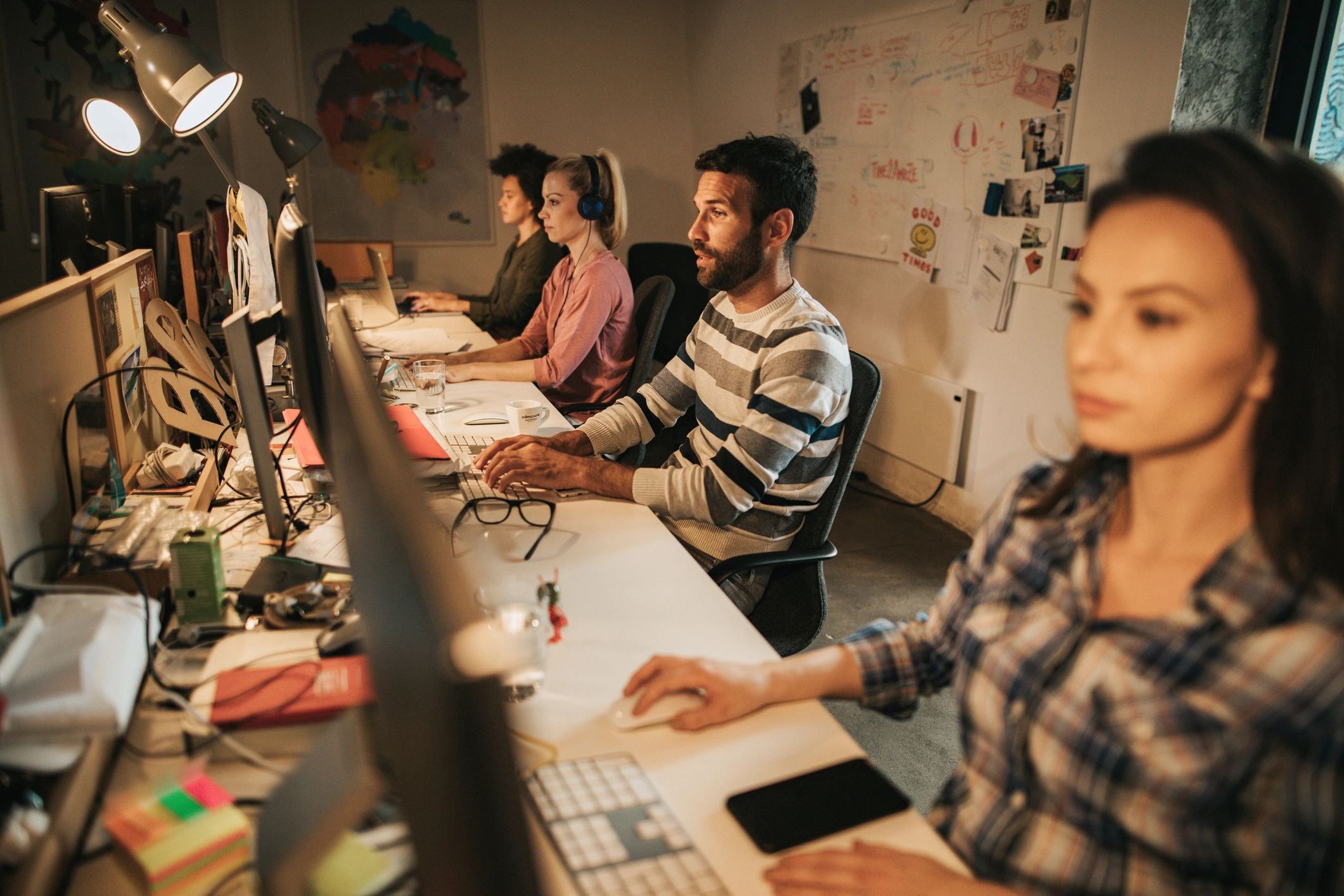 IT team working together to keep systems running