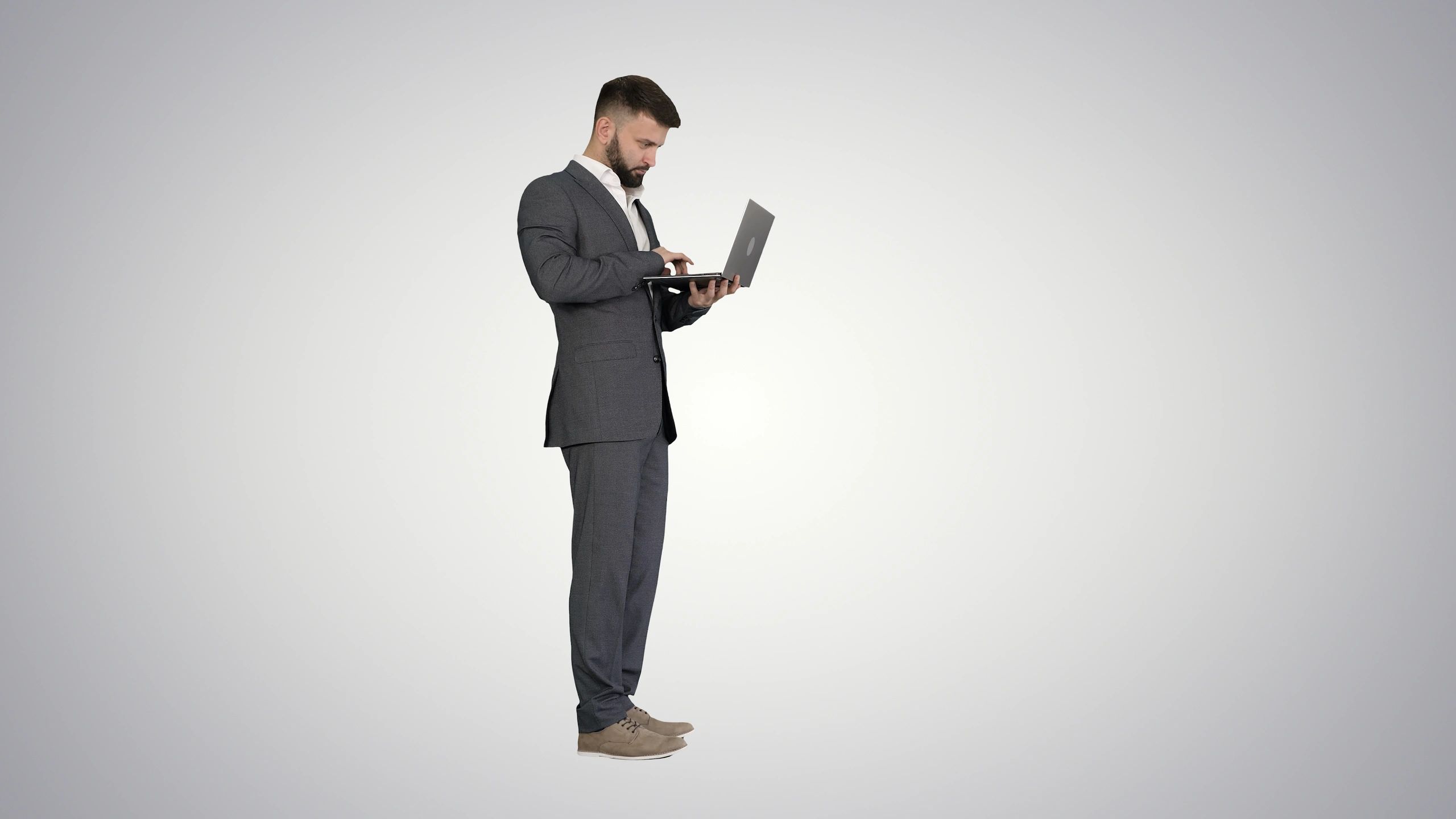 IT professional working on a laptop for cloud support