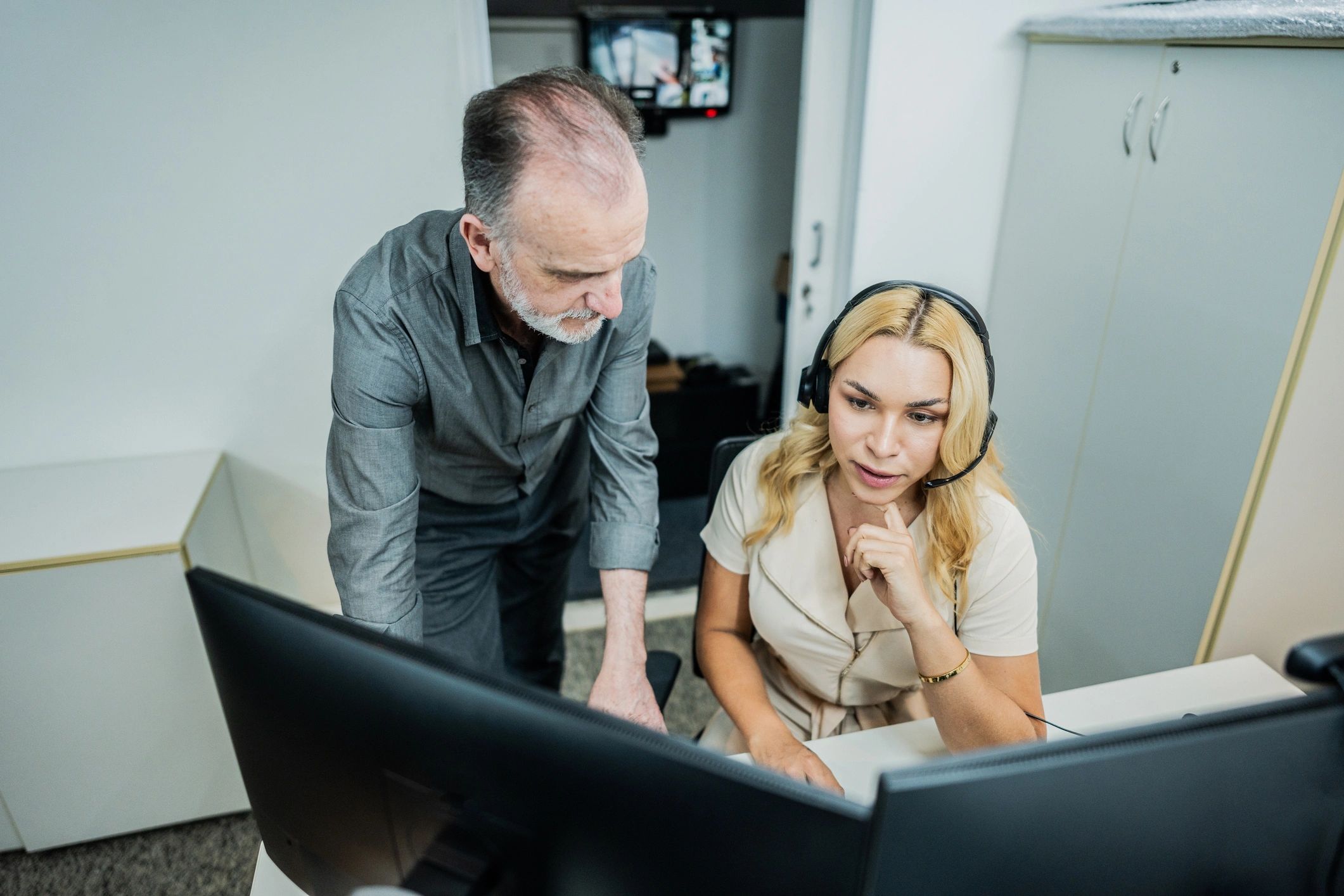 IT support technician assisting a client in an office