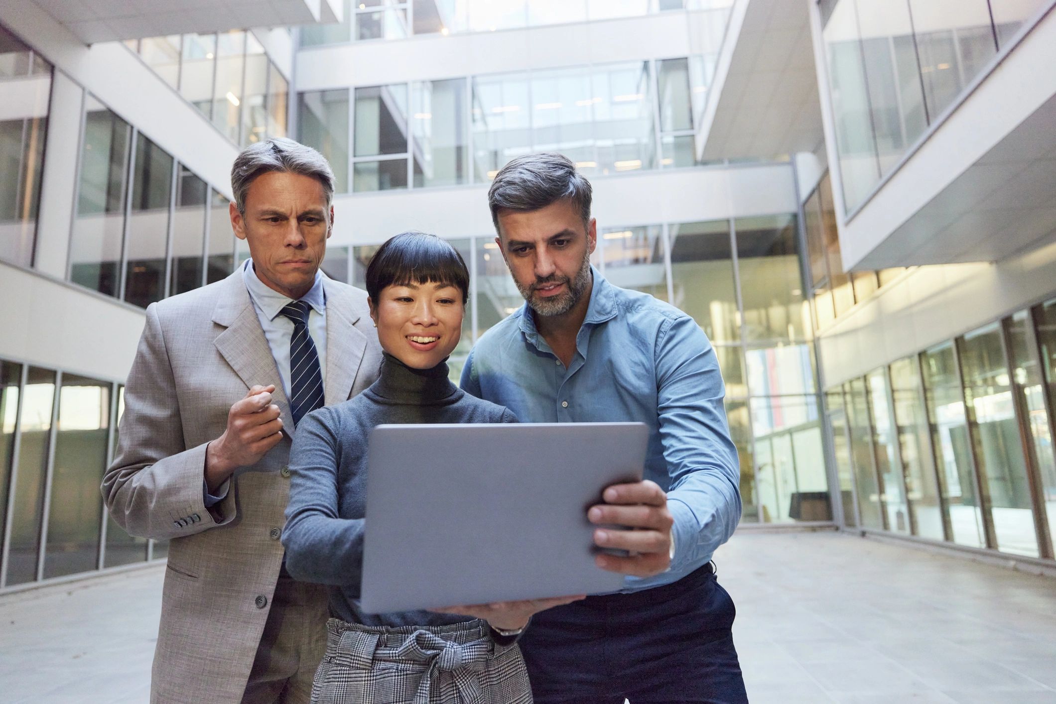Business team working on a laptop representing secure work practices