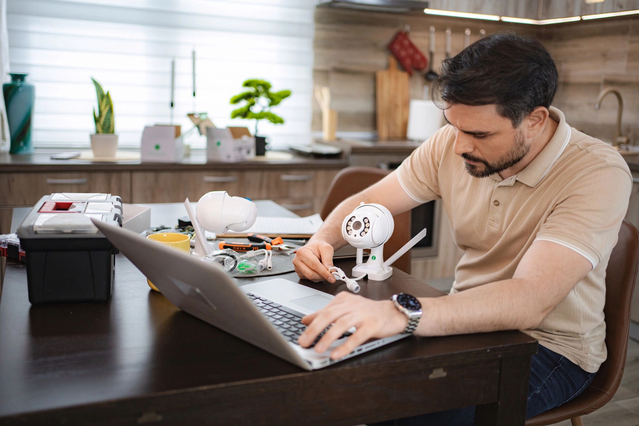 Technician setting up a CCTV camera system